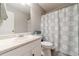 Cozy bathroom with a white vanity, neutral wall color, and tub shower at 1623 Pratt Rd, Covington, GA 30014