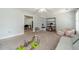 Bonus room includes neutral walls, carpeted flooring, and built-in shelves at 1623 Pratt Rd, Covington, GA 30014