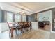 Dining area with gray walls, white trim, light fixture and a view into living room at 1623 Pratt Rd, Covington, GA 30014