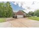 Well-maintained brick home with manicured landscaping and a spacious driveway at 1623 Pratt Rd, Covington, GA 30014