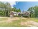 Beautiful brick home with a manicured lawn, an attached garage, and an inviting front porch at 1623 Pratt Rd, Covington, GA 30014