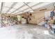 Spacious two-car garage with ample storage shelving and access to the home at 1623 Pratt Rd, Covington, GA 30014