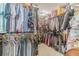 Organized walk-in closet with ample shelving and hanging space at 1623 Pratt Rd, Covington, GA 30014