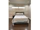 Neutral bedroom with a large comfortable bed, modern decor, and plenty of natural light at 2668 Memorial Se Dr, Atlanta, GA 30317