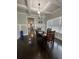 Traditional dining room with hardwood floors, coffered ceiling, and natural light at 2668 Memorial Se Dr, Atlanta, GA 30317