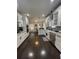 Spacious kitchen features white cabinets, stainless appliances, and hardwood floors at 2668 Memorial Se Dr, Atlanta, GA 30317