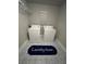Clean laundry room with patterned flooring, a washer, and a dryer at 2668 Memorial Se Dr, Atlanta, GA 30317