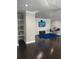 Bright living room featuring a TV mounted on a wall and desk at 2668 Memorial Se Dr, Atlanta, GA 30317