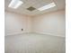 Basement featuring large area carpet, neutral walls and ceilings, and access to other rooms at 115 Windover Ct, Roswell, GA 30075