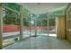 Sunroom with glass windows and a view of the backyard at 115 Windover Ct, Roswell, GA 30075