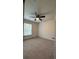 This bright bedroom offers a ceiling fan and a large window at 3204 Fairington Village Dr, Lithonia, GA 30038