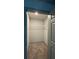 The well-organized walk-in closet has carpeted floors and a wire shelf at 3204 Fairington Village Dr, Lithonia, GA 30038