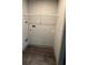 The laundry room has wood-look floors and is equipped with washer and dryer hookups at 3204 Fairington Village Dr, Lithonia, GA 30038