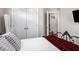 Bedroom showcasing a stylish bed frame, pillows and a large wardrobe at 623 Brennan Dr, Decatur, GA 30033