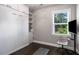 Bedroom with murphy bed, desk, and large window providing natural light at 623 Brennan Dr, Decatur, GA 30033