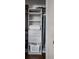 Organized closet with shelves and drawers for optimal storage at 623 Brennan Dr, Decatur, GA 30033
