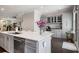 Gourmet kitchen has a large island with seating, gray cabinets, and stainless steel appliances at 623 Brennan Dr, Decatur, GA 30033
