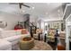 Spacious living room showcasing hardwood floors, stylish furniture, and a staircase leading to the upper level at 623 Brennan Dr, Decatur, GA 30033