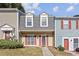 Charming townhome with red shutters and well-manicured front lawn at 3444 Washington Way, Atlanta, GA 30340