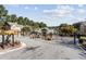 Secured community entrance with automated gate, pedestrian access and landscaped surroundings for enhanced curb appeal at 3444 Washington Way, Atlanta, GA 30340