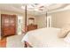 Bright bedroom featuring dark wood furniture, and an inviting feel at 5767 Wembley Dr, Douglasville, GA 30135