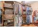 Spacious walk-in closet with custom shelving and ample storage space at 5767 Wembley Dr, Douglasville, GA 30135