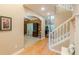 Bright foyer with hardwood floors, showcasing the home's open floor plan at 5767 Wembley Dr, Douglasville, GA 30135