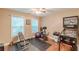 An inviting game room featuring workout equipment and a Monopoly pinball machine at 5767 Wembley Dr, Douglasville, GA 30135