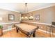 Game room with billiard table and views to other living spaces at 5767 Wembley Dr, Douglasville, GA 30135