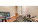 A game room with wood floors featuring workout equipment and exercise mats at 5767 Wembley Dr, Douglasville, GA 30135