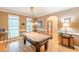Game room with billiard table and lots of windows at 5767 Wembley Dr, Douglasville, GA 30135