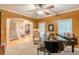 Stylish living room with grand piano, neutral decor, and seamless flow to other living spaces at 5767 Wembley Dr, Douglasville, GA 30135