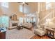 Elegant living room with a fireplace, hardwood floors, and an open floor plan at 5767 Wembley Dr, Douglasville, GA 30135