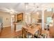 View into the kitchen from the living area, with stairs leading to the second story at 5767 Wembley Dr, Douglasville, GA 30135