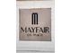 Close-up of the 'MAYFAIR on main' sign, set against a brick background at 205 Mayfair Ct, Alpharetta, GA 30009