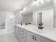 Bright bathroom featuring double vanity, modern fixtures, and a glass-enclosed shower at 2766 Wander Ln, Alpharetta, GA 30022