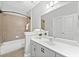 Well-lit bathroom featuring a bathtub, tiled shower, and a spacious vanity at 2766 Wander Ln, Alpharetta, GA 30022