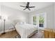 Cozy bedroom with a ceiling fan, a comfy bed, and access to a private balcony at 2766 Wander Ln, Alpharetta, GA 30022