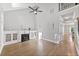 Spacious living room featuring a fireplace, built-in cabinets, hardwood floors, and bright, neutral decor at 2766 Wander Ln, Alpharetta, GA 30022