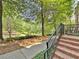 A view of brick staircase leading to the front door and a sidewalk showcasing the manicured landscaping at 2766 Wander Ln, Alpharetta, GA 30022