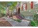 Attractive townhouses featuring well-maintained landscaping, brick stairs, and wrought iron railings at 2766 Wander Ln, Alpharetta, GA 30022
