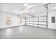 Spacious two car garage with painted floor and natural light at 3110 Haverhill Ne Cv, Conyers, GA 30012