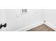 Bright laundry room area features hookups and modern white trim at 3110 Haverhill Ne Cv, Conyers, GA 30012