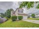 Charming two-story home with a two-car garage, landscaped yard, and inviting curb appeal at 3623 Thurleston Sw Ct, Marietta, GA 30008