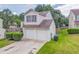 Charming two-story home with a two-car garage, landscaped yard, and inviting curb appeal at 3623 Thurleston Sw Ct, Marietta, GA 30008