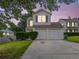 Charming two-story home with a two-car garage, landscaped yard, and inviting curb appeal at 3623 Thurleston Sw Ct, Marietta, GA 30008
