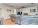 Cozy living room with hardwood floors, a fireplace, and ample natural light at 3623 Thurleston Sw Ct, Marietta, GA 30008