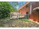 Brick home exterior with multi-level deck at 431 Keeler Woods Nw Dr, Marietta, GA 30064