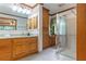 Bathroom vanity with granite counters, ample storage, and a glass-enclosed shower at 431 Keeler Woods Nw Dr, Marietta, GA 30064