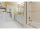Bathroom with granite countertop, shower and bath combo with glass doors at 431 Keeler Woods Nw Dr, Marietta, GA 30064